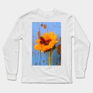 Butterfly Resting On Sunflower With Blue Wall Long Sleeve T-Shirt